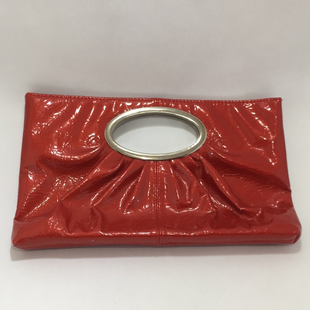 NWOT Reddish orange clutch purse